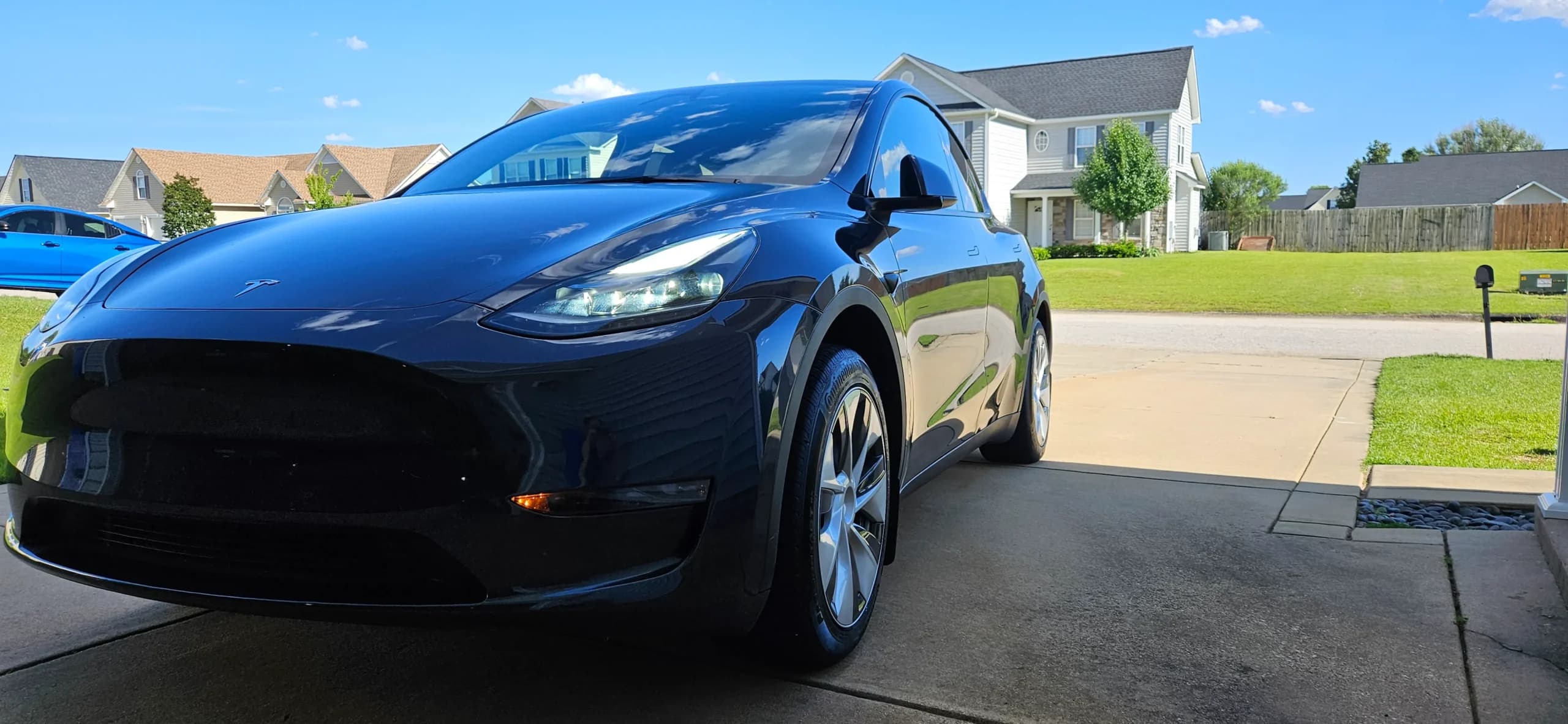 Mirror-like paint finish after full exterior detail — Fayetteville car detailing